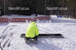 18.03.2016, Khanty-Mansiysk, Russia (RUS): Biathlon Feature: Marian Hiller (GER), biathlonworld tv, prepares the golbes for production -  IBU world cup biathlon,  cups, Khanty-Mansiysk (RUS). www.nordicfocus.com. © Manzoni/NordicFocus. Every downloaded picture is fee-liable.
