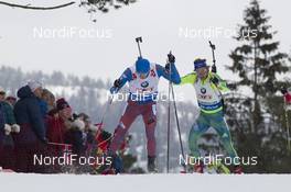 12.03.2016, Oslo, Norway (NOR): Maxim Tsvetkov (RUS), Torstein Stenersen (SWE) - IBU world championships biathlon, relay men, Oslo (NOR). www.nordicfocus.com. © NordicFocus. Every downloaded picture is fee-liable.