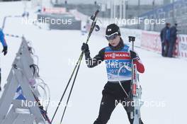 01.03.2016, Oslo, Norway (NOR): Event Feature: Japanese athlete taking away a riffle from the rack - IBU world championships biathlon, training, Oslo (NOR). www.nordicfocus.com. © Manzoni/NordicFocus. Every downloaded picture is fee-liable.