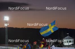 27.11.2016, Oestersund, Sweden, (SWE): Event Feature: Swedish Fans with Flags in the Dawn - IBU world cup biathlon, relay mixed, Oestersund (SWE). www.nordicfocus.com. © Manzoni/NordicFocus. Every downloaded picture is fee-liable.