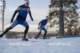 02.12.2016, Oestersund, Sweden, (SWE): Mathias Fredriksson (SWE), Guillaume Robert (FRA), Salomon race service, (l-r) - IBU world cup biathlon, training, Oestersund (SWE). www.nordicfocus.com. © Manzoni/NordicFocus. Every downloaded picture is fee-liable.