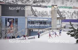 20.02.2016, Lahti, Finland (FIN): female ahtletes passing the stadium buidling   - FIS world cup cross-country, individual sprint, Lahti (FIN). www.nordicfocus.com. © Felgenhauer/NordicFocus. Every downloaded picture is fee-liable.