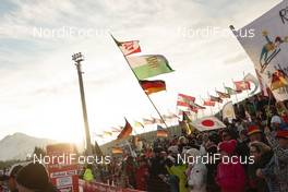 30.01.2016, Seefeld, Austria (AUT): spectators raising their flags during sunset   - FIS world cup nordic combined, individual gundersen HS109/10km, Seefeld (AUT). www.nordicfocus.com. © Modica/NordicFocus. Every downloaded picture is fee-liable.