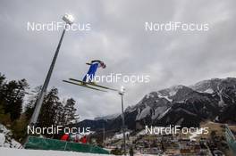 18.12.2016, Ramsau, Austria (AUT): forejumper with Dachstein mountains - FIS world cup nordic combined, individual gundersen HS96/10km, Ramsau (AUT). www.nordicfocus.com. © Rauschendorfer/NordicFocus. Every downloaded picture is fee-liable.