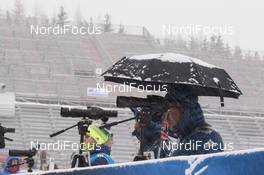 17.01.2018, Antholz, Italy (ITA): Event Feature: Kazakhian coaches with umbrella at the shooting range -  IBU world cup biathlon, training, Antholz (ITA). www.nordicfocus.com. © Manzoni/NordicFocus. Every downloaded picture is fee-liable.