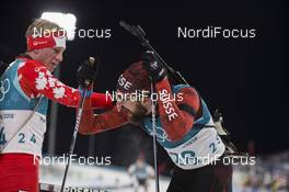 15.02.2018, Pyeongchang, Korea (KOR): Scott Gow (CAN), Benjamin Weger (SUI), (l-r) - XXIII. Olympic Winter Games Pyeong Chang 2018, biathlon, individual men, Pyeong Chang (KOR). www.nordicfocus.com. © Manzoni/NordicFocus. Every downloaded picture is fee-liable.