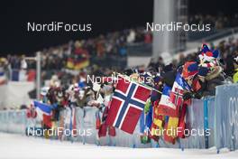 18.02.2018, Pyeongchang, Korea (KOR): Event Feature: packed grand stand with fans and flags - XXIII. Olympic Winter Games Pyeongchang 2018, biathlon, mass men, Pyeongchang (KOR). www.nordicfocus.com. © Manzoni/NordicFocus. Every downloaded picture is fee-liable.