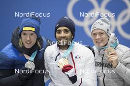 13.02.2018, Pyeongchang, Korea (KOR): Sebastian Samuelsson (SWE), Martin Fourcade (FRA), Benedikt Doll (GER), (l-r) - XXIII. Olympic Winter Games Pyeongchang 2018, biathlon, medals, Pyeongchang (KOR). www.nordicfocus.com. © Manzoni/NordicFocus. Every downloaded picture is fee-liable.