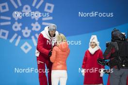 16.02.2018, Pyeongchang, Korea (KOR): Dominik Landertinger (AUT), Nicole Resch (GER) IBU secretary general, (l-r) - XXIII. Olympic Winter Games Pyeongchang 2018, biathlon, medals, Pyeongchang (KOR). www.nordicfocus.com. © Manzoni/NordicFocus. Every downloaded picture is fee-liable.