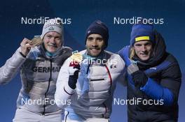 13.02.2018, Pyeongchang, Korea (KOR): Benedikt Doll (GER), Martin Fourcade (FRA), Sebastian Samuelsson (SWE), (l-r) - XXIII. Olympic Winter Games Pyeongchang 2018, biathlon, medals, Pyeongchang (KOR). www.nordicfocus.com. © Manzoni/NordicFocus. Every downloaded picture is fee-liable.
