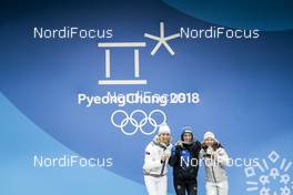 16.02.2018, Pyeongchang, Korea (KOR): Anastasiya Kuzmina (SVK), Hanna Oeberg (SWE), Laura Dahlmeier (GER), (l-r) - XXIII. Olympic Winter Games Pyeongchang 2018, biathlon, medals, Pyeongchang (KOR). www.nordicfocus.com. © Modica/NordicFocus. Every downloaded picture is fee-liable.