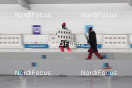 11.02.2018, Pyeongchang, Korea (KOR): Event Feature: range staff run for target change - XXIII. Olympic Winter Games Pyeongchang 2018, biathlon, sprint men, Pyeongchang (KOR). www.nordicfocus.com. © Manzoni/NordicFocus. Every downloaded picture is fee-liable.
