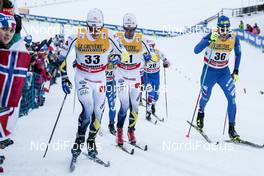 06.01.2018, Val di Fiemme, Italy (ITA): Jens Burman (SWE), Marcus Hellner (SWE), Dietmar Noeckler (ITA), (l-r)  - FIS world cup cross-country, tour de ski, mass men, Val di Fiemme (ITA). www.nordicfocus.com. © Modica/NordicFocus. Every downloaded picture is fee-liable.