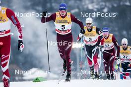 06.01.2018, Val di Fiemme, Italy (ITA): Alexander Bolshunov (RUS), Martin Johnsrud Sundby (NOR), Andrey Larkov (RUS), (l-r)  - FIS world cup cross-country, tour de ski, mass men, Val di Fiemme (ITA). www.nordicfocus.com. © Modica/NordicFocus. Every downloaded picture is fee-liable.