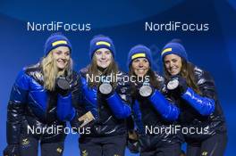 18.02.2018, Pyeongchang, Korea (KOR): Stina Nilsson (SWE), Ebba Andersson (SWE), Charlotte Kalla (SWE), Anna Haag (SWE), (l-r)  - XXIII. Olympic Winter Games Pyeongchang 2018, cross-country, medals, Pyeongchang (KOR). www.nordicfocus.com. © Manzoni/NordicFocus. Every downloaded picture is fee-liable.