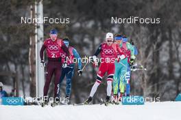 18.02.2018, Pyeongchang, Korea (KOR): Andrey Larkov (RUS), Didrik Toenseth (NOR), (l-r)  - XXIII. Olympic Winter Games Pyeongchang 2018, cross-country, 4x10km men,  Pyeongchang (KOR). www.nordicfocus.com. © Modica/NordicFocus. Every downloaded picture is fee-liable.