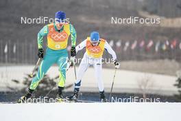 18.02.2018, Pyeongchang, Korea (KOR): Vitaliy Pukhkalo (KAZ), Matti Heikkinen (FIN), (l-r)  - XXIII. Olympic Winter Games Pyeongchang 2018, cross-country, 4x10km men,  Pyeongchang (KOR). www.nordicfocus.com. © Modica/NordicFocus. Every downloaded picture is fee-liable.