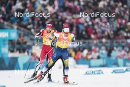 18.02.2018, Pyeongchang, Korea (KOR): Russell Kennedy (CAN), Marcus Hellner (SWE), (l-r)  - XXIII. Olympic Winter Games Pyeongchang 2018, cross-country, 4x10km men,  Pyeongchang (KOR). www.nordicfocus.com. © Modica/NordicFocus. Every downloaded picture is fee-liable.