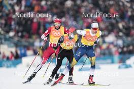 18.02.2018, Pyeongchang, Korea (KOR): Russell Kennedy (CAN), Marcus Hellner (SWE), (l-r)  - XXIII. Olympic Winter Games Pyeongchang 2018, cross-country, 4x10km men,  Pyeongchang (KOR). www.nordicfocus.com. © Modica/NordicFocus. Every downloaded picture is fee-liable.