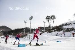 18.02.2018, Pyeongchang, Korea (KOR): Andrew Newell (USA), Len Valjas (CAN), (l-r)  - XXIII. Olympic Winter Games Pyeongchang 2018, cross-country, 4x10km men,  Pyeongchang (KOR). www.nordicfocus.com. © Modica/NordicFocus. Every downloaded picture is fee-liable.