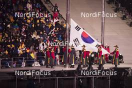 09.02.2018, Pyeongchang, Korea (KOR): Event Feature: the Korean Flag is brought in - XXIII. Olympic Winter Games Pyeongchang 2018, opening ceremony, Pyeongchang (KOR). www.nordicfocus.com. © Manzoni/NordicFocus. Every downloaded picture is fee-liable.