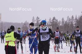 04.03.2018, Mora, Sweden (SWE): Event Feature: undefined athlete gets a drink - Visma Ski Classics, 94th Vasaloppet, Mora (SWE). www.nordicfocus.com. © Manzoni/NordicFocus. Every downloaded picture is fee-liable.