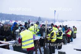 04.03.2018, Mora, Sweden (SWE): Event Feature: busy volunteers before the start - Visma Ski Classics, 94th Vasaloppet, Mora (SWE). www.nordicfocus.com. © Manzoni/NordicFocus. Every downloaded picture is fee-liable.
