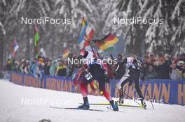 13.01.2019, Oberhof, Germany (GER): Vetle Sjaastad Christiansen (NOR), Michael Roesch (BEL), (l-r) -  IBU world cup biathlon, relay men, Oberhof (GER). www.nordicfocus.com. © Manzoni/NordicFocus. Every downloaded picture is fee-liable.