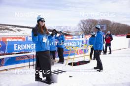 17.02.2019, Soldier Hollow, United States of America (USA): Event Feature: a volunteer is stretching before competition -  IBU world cup biathlon, single mixed relay, Soldier Hollow (USA). www.nordicfocus.com. © Manzoni/NordicFocus. Every downloaded picture is fee-liable.