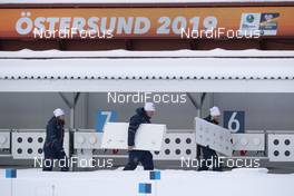 09.03.2019, Oestersund, Sweden (SWE): Event Feature: shooting range volunteers remove the paper targets - IBU world championships biathlon, sprint men, Oestersund (SWE). www.nordicfocus.com. © Manzoni/NordicFocus. Every downloaded picture is fee-liable.