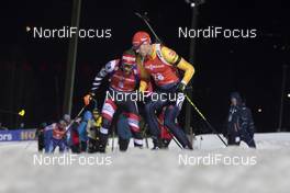 04.12.2019, Oestersund, Sweden, (SWE): Simon Eder (AUT), Arnd Peiffer (GER), (l-r) - IBU world cup biathlon, individual men, Oestersund (SWE). www.nordicfocus.com. © Manzoni/NordicFocus. Every downloaded picture is fee-liable.
