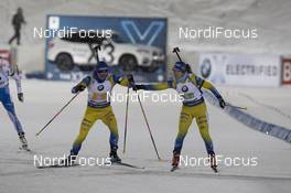 30.11.2019, Oestersund, Sweden, (SWE): Jesper Nelin (SWE), Mona Brorsson (SWE), (l-r) - IBU world cup biathlon, relay mixed, Oestersund (SWE). www.nordicfocus.com. © Manzoni/NordicFocus. Every downloaded picture is fee-liable.