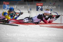 30.11.2019, Oestersund, Sweden, (SWE): Martin Ponsiluoma (SWE), Johannes Thingnes Boe (NOR) - IBU world cup biathlon, relay mixed, Oestersund (SWE). www.nordicfocus.com. © Nico Manzoni/NordicFocus. Every downloaded picture is fee-liable.