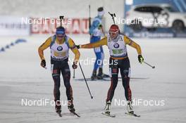 30.11.2019, Oestersund, Sweden, (SWE): Simon Schempp (GER), Denise Herrmann (GER), (l-r) - IBU world cup biathlon, relay mixed, Oestersund (SWE). www.nordicfocus.com. © Manzoni/NordicFocus. Every downloaded picture is fee-liable.