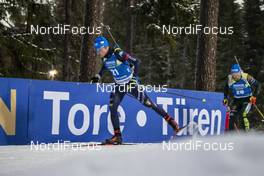01.12.2019, Oestersund, Sweden, (SWE): Lukas Hofer (ITA), Erik Lesser (GER) - IBU world cup biathlon, sprint men, Oestersund (SWE). www.nordicfocus.com. © Nico Manzoni/NordicFocus. Every downloaded picture is fee-liable.