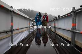 20.12.2019, Annecy-Le Grand Bornand, France (FRA): Event Feature: Match TV crew walks in the rain -  IBU world cup biathlon, sprint women, Annecy-Le Grand Bornand (FRA). www.nordicfocus.com. © Manzoni/NordicFocus. Every downloaded picture is fee-liable.