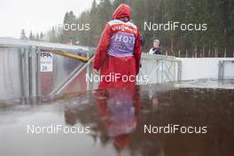 20.12.2019, Annecy-Le Grand Bornand, France (FRA): Event Feature: a lonely AFP-photographer in the rain -  IBU world cup biathlon, sprint women, Annecy-Le Grand Bornand (FRA). www.nordicfocus.com. © Manzoni/NordicFocus. Every downloaded picture is fee-liable.