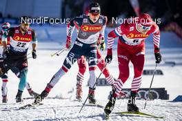 01.01.2019, Val Mustair, Switzerland (SUI): Johannes Hoesflot Klaebo (NOR), Sergey Ustiugov (RUS), (l-r)  - FIS world cup cross-country, tour de ski, individual sprint, Val Mustair (SUI). www.nordicfocus.com. © Modica/NordicFocus. Every downloaded picture is fee-liable.