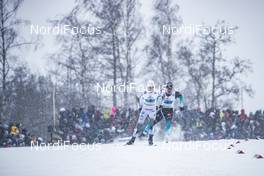 27.01.2019, Ulricehamn, Sweden (SWE): Viktor Thorn (SWE), Richard Jouve (FRA), (l-r)  - FIS world cup cross-country, 4x10km men, Ulricehamn (SWE). www.nordicfocus.com. © Modica/NordicFocus. Every downloaded picture is fee-liable.