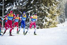 28.12.2019, Lenzerheide, Switzerland (SUI): Alexander Bolshunov (RUS), Sergey Ustiugov (RUS), Iivo Niskanen (FIN), Johannes Hoesflot Klaebo (NOR), (l-r)  - FIS world cup cross-country, tour de ski, mass women, Lenzerheide (SUI). www.nordicfocus.com. © Modica/NordicFocus. Every downloaded picture is fee-liable.