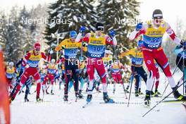 28.12.2019, Lenzerheide, Switzerland (SUI): Sjur Roethe (NOR), Lucas Boegl (GER), (l-r)  - FIS world cup cross-country, tour de ski, mass women, Lenzerheide (SUI). www.nordicfocus.com. © Modica/NordicFocus. Every downloaded picture is fee-liable.
