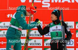 13.01.2019, Val di Fiemme, Italy (ITA): Vinzenz Geiger, Akito Watabe (l-r) - FIS world cup nordic combined, individual gundersen HS135/10km, Val di Fiemme (ITA). www.nordicfocus.com. © Volk/NordicFocus. Every downloaded picture is fee-liable.