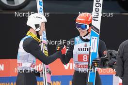 01.01.2019, Garmisch-Partenkirchen, Germany (GER): Evgeniy Klimov (RUS), Stephan Leyhe (GER), (l-r)  - FIS world cup ski jumping, four hills tournament, individual HS140, Garmisch-Partenkirchen (GER). www.nordicfocus.com. © Rauschendorfer/NordicFocus. Every downloaded picture is fee-liable.