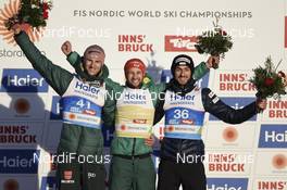 23.02.2019, Innsbruck, Austria (AUT): Karl Geiger (GER), Markus Eisenbichler (GER), Killian Peier (SUI), (l-r) - FIS nordic world ski championships, ski jumping, individual HS130, Innsbruck (AUT). www.nordicfocus.com. © THIBAUT/NordicFocus. Every downloaded picture is fee-liable.
