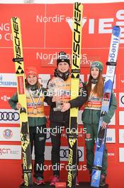 24.03.2019, Chaikovsky, Russia (RUS): Maren Lundby (NOR), Katharina Althaus (GER), Juliane Seyfarth (GER) - FIS world cup ski jumping ladies, cups, Chaikovsky (RUS). www.nordicfocus.com. © Tumashov/NordicFocus. Every downloaded picture is fee-liable.
