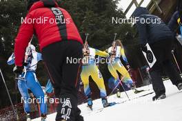 12.01.2020, Oberhof, Germany (GER): Event Feature: undefined athletes compete on the track while the coaches cheer them up -  IBU world cup biathlon, mass women, Oberhof (GER). www.nordicfocus.com. © Manzoni/NordicFocus. Every downloaded picture is fee-liable.