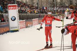 19.01.2020, Ruhpolding, Germany (GER): Scott Gow (CAN), Jules Burnotte (CAN), Christian Gow (CAN) -  IBU world cup biathlon, pursuit men, Ruhpolding (GER). www.nordicfocus.com. © Tumashov/NordicFocus. Every downloaded picture is fee-liable.