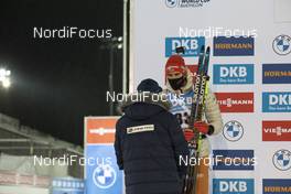 03.12.2020, Kontiolahti, Finland (FIN): Arnd Peiffer (GER), Olle Dahlin (SWE), IBU President, (l-r) -  IBU World Cup Biathlon, sprint men, Kontiolahti (FIN). www.nordicfocus.com. © Manzoni/NordicFocus. Every downloaded picture is fee-liable.