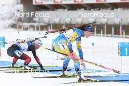 12.12.2020, Hochfilzen, Austria (AUT): Tiril Eckhoff (NOR), Hanna Oeberg (SWE), (l-r) -  IBU World Cup Biathlon, relay women, Hochfilzen (AUT). www.nordicfocus.com. © Manzoni/NordicFocus. Every downloaded picture is fee-liable.
