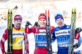 01.01.2020, Toblach, Italy (ITA): Sergey Ustiugov (RUS), Alexander Bolshunov (RUS), Iivo Niskanen (FIN), (l-r)  - FIS world cup cross-country, tour de ski, pursuit men, Toblach (ITA). www.nordicfocus.com. © Modica/NordicFocus. Every downloaded picture is fee-liable.